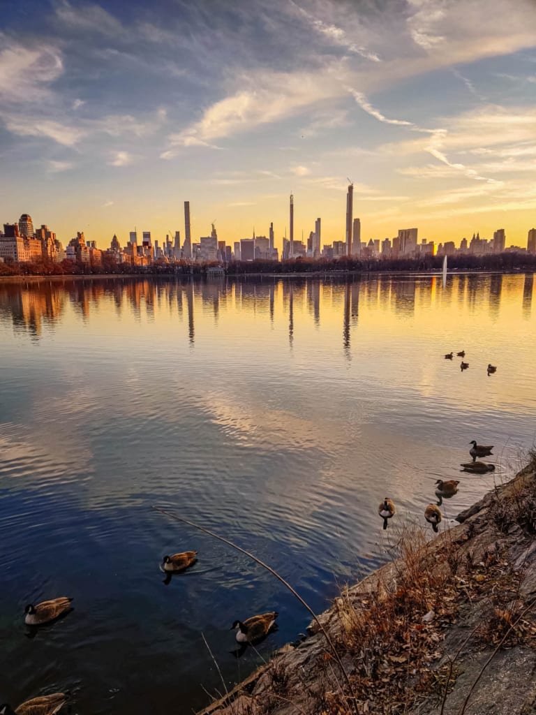 Things to Do in Central Park NYC: The Ultimate Guide! reservoir jackie kennedy running