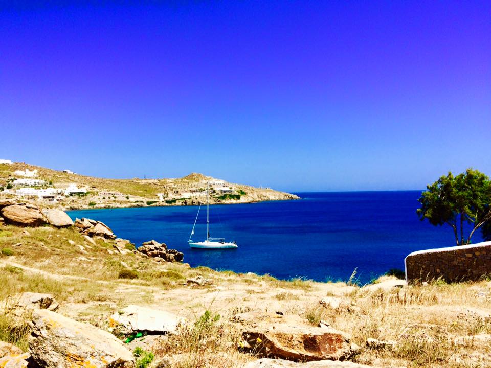 Travel Guide to Mykonos_What to do_Where to Stay_Mykonos Island_Greece_3 day itinerary_blog_PAradise beach_sail boat_ocean_cliffs_party island_yacht party