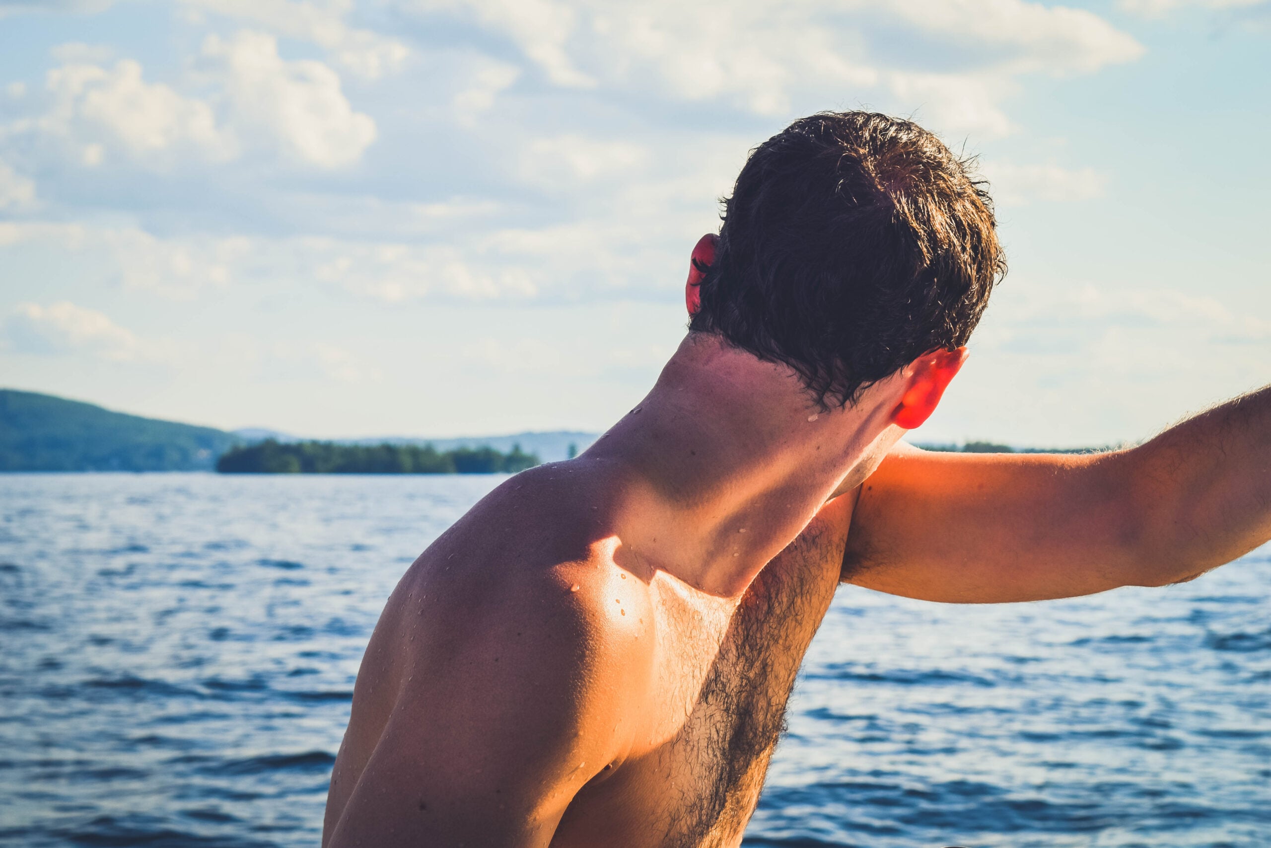 Lake Winnipesaukee_New Hampshire_Travel Guide_What to do_What to See_patrick_chilling_sunset_water_jump_boat