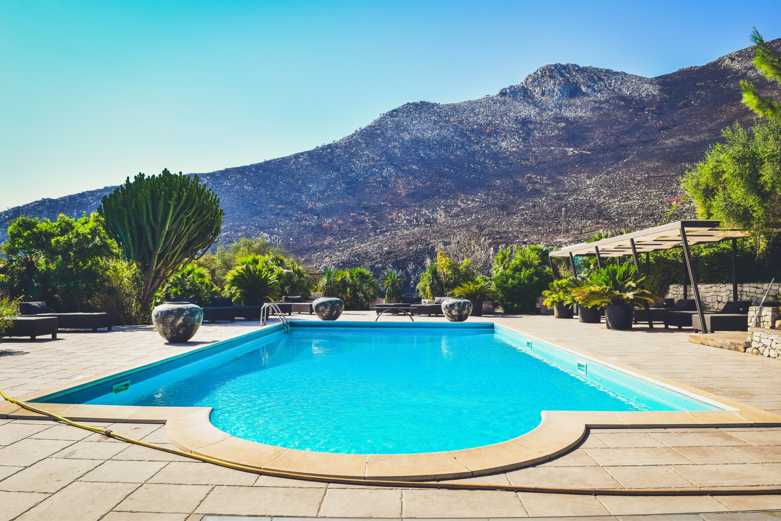 3 pool view mountains nature forest landscape Hotel Baglio La Porta Sicilia near San Vito Lo Capo Private exclusive resort cliffs sicily hidden gem off the beaten path luxury