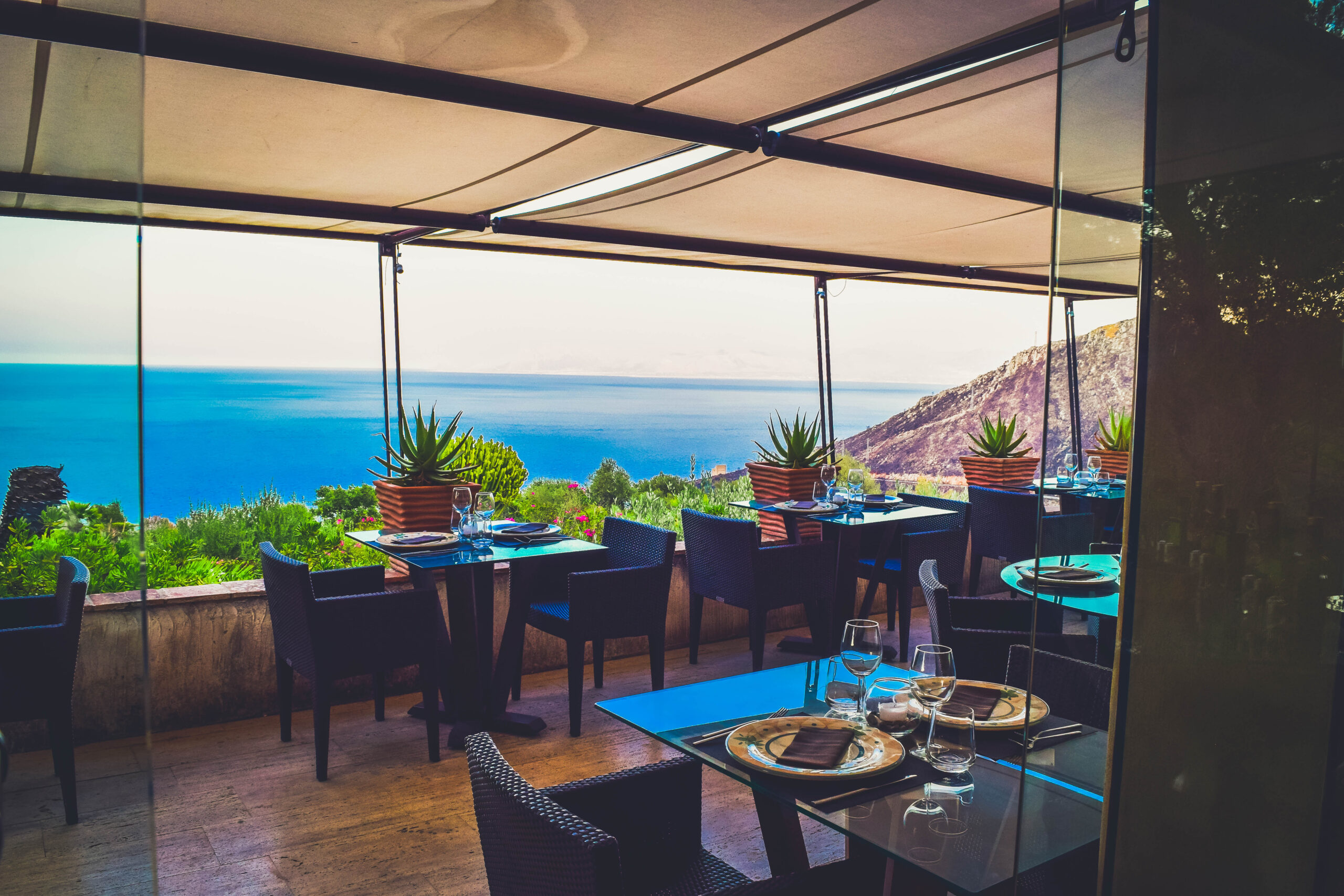 breakfast tables Hotel Baglio La Porta Sicilia near San Vito Lo Capo Riserva dello Zingaro Private exclusive resort cliffs best of sicily sicilia hidden gem off the beaten path luxury