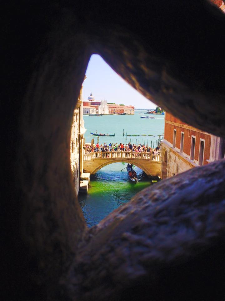 How To Travel In Italy- 24 Hours In Venice On A Budget view from prison prigione palazzo ducale royal palace st. mark's square piazza san marco venezia travel blog photography ponte bridge canal svadore