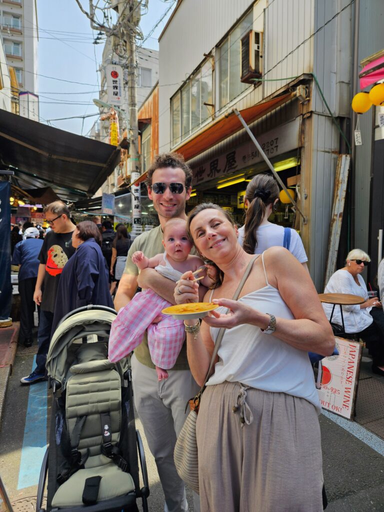 Narrow alley of street food stalls at Tsukiji Outer Market
