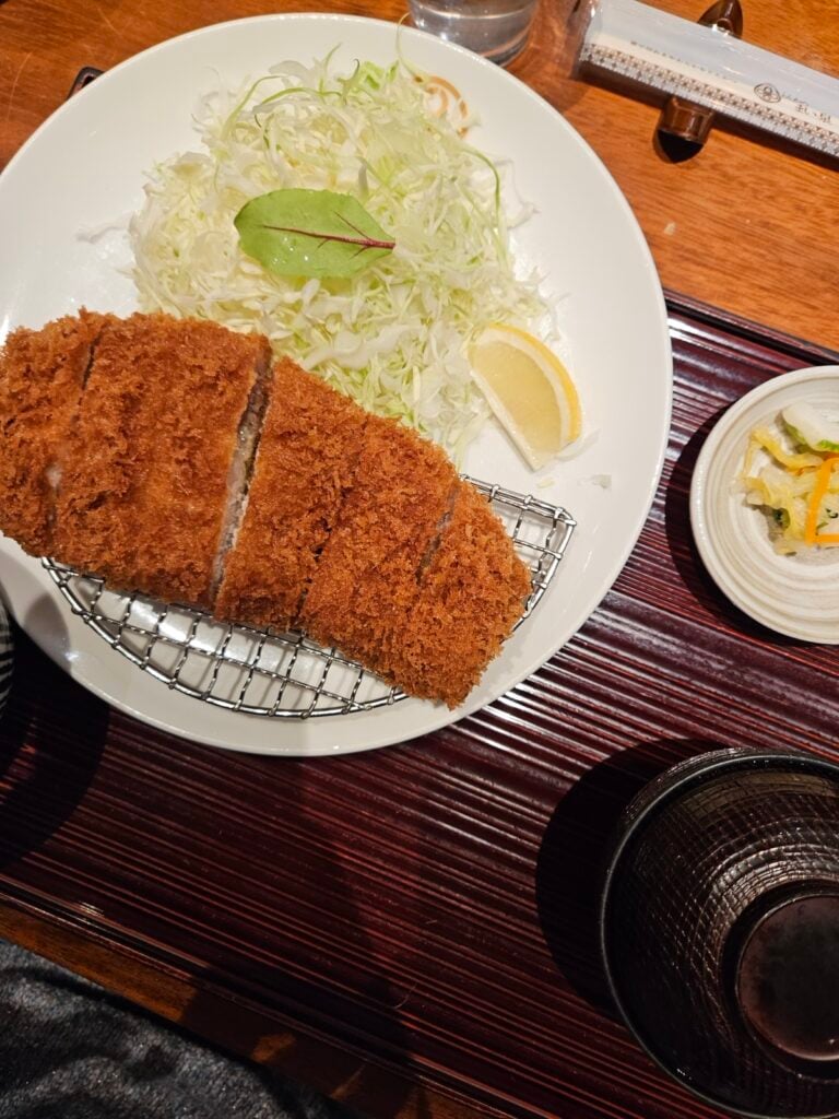 The high vaulted ceilings of Maisen Tonkatsu, a world-famous restaurant inside a converted 1960s bathhouse in Tokyo