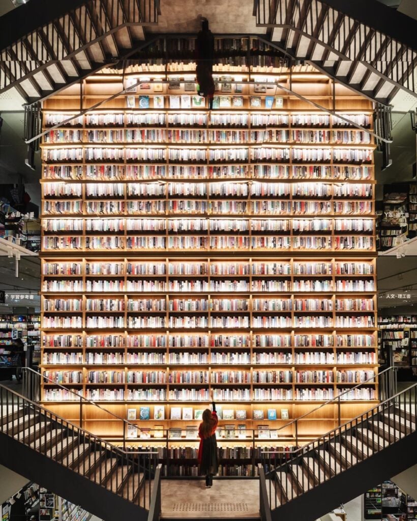 Modern architecture and floor-to-ceiling bookshelves at T-Site Daikanyama, voted one of the most beautiful bookstores in the world.