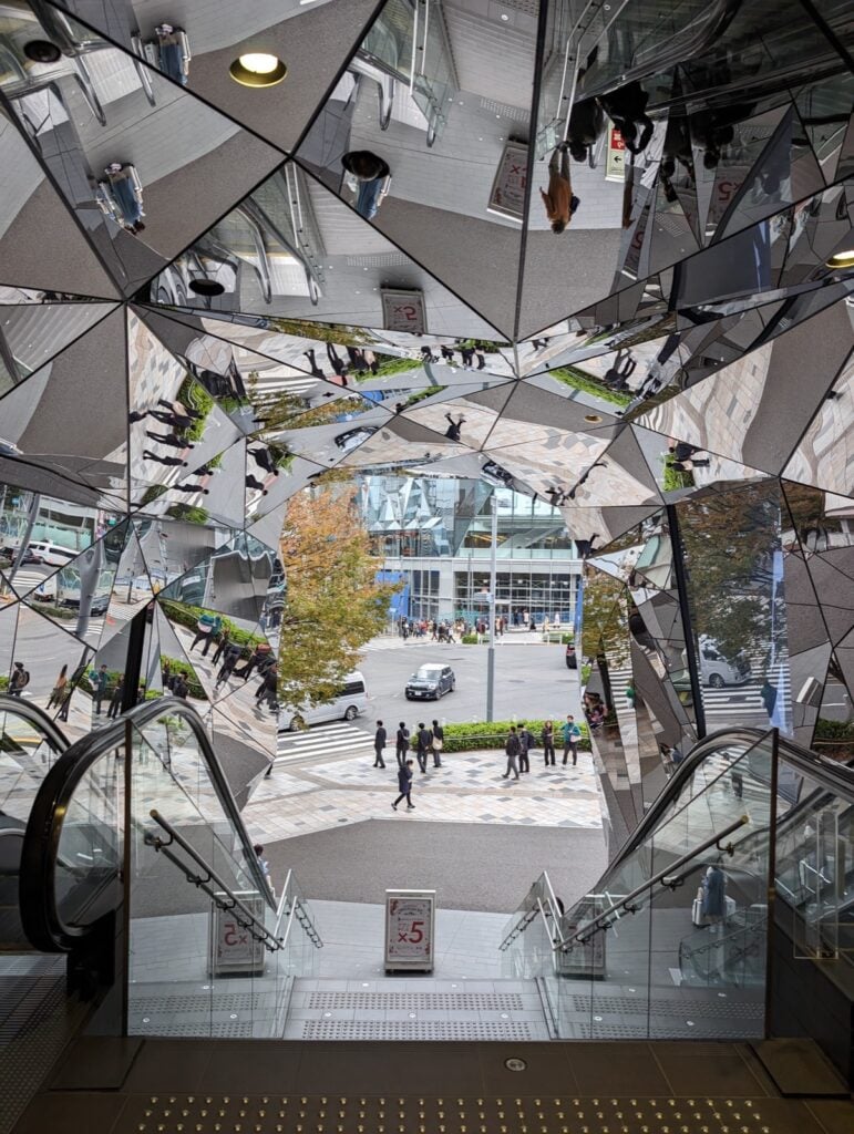 The kaleidoscopic mirrored entrance of Tokyu Plaza Omotesando, a must-see architectural landmark during 4 days in Tokyo